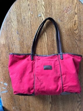 Red Canvas Tote with Brown Trim and Leather Handles